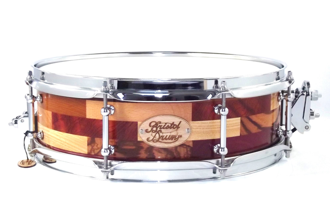 solid wood snare drum, solid wooden snare drum, segmented snare drum