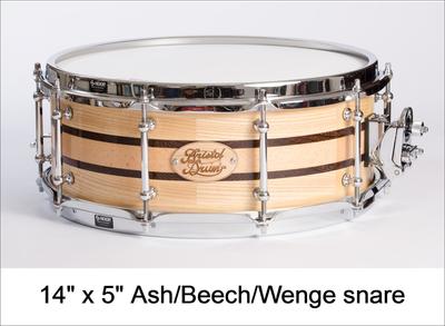 Segmented solid wood snare drum